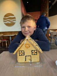 Ginger Bread building working on developing Fine Motor Skills.
